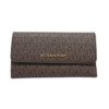 Mua túi Michael Kors Brown Signature Coated Canvas Jet Set Large Logo Trifold Wallet sale