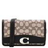 Túi đeo chéo Coach Bandit phục hồi từ vải jacquard họa tiết đặc trưng
